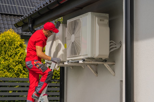 A man performs an HVAC Maintenance Check in Gresham, OR