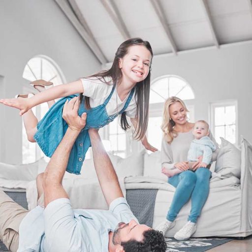 Happy family enjoying a cool home thanks to the work of their favorite Gresham or hvac contractor, talon mechanical.